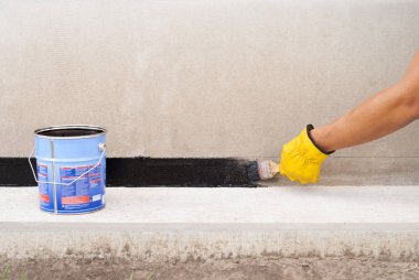 bitumen waterproofing of the foundation clipart