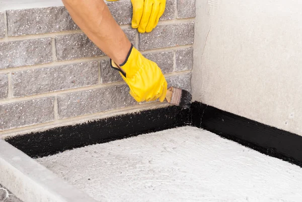 Bitumen waterproofing of the foundation — Stock Photo, Image