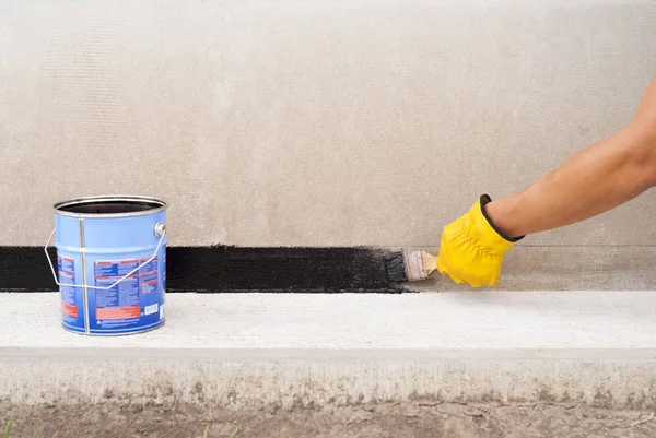 Bitumen waterproofing of the foundation — Stock Photo, Image