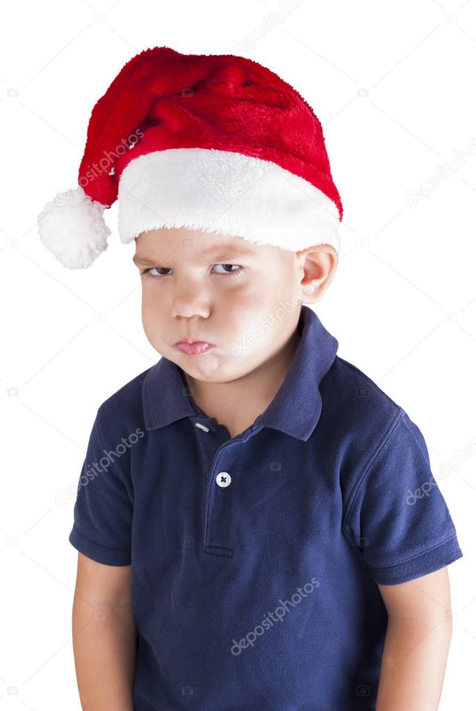 angry boy in a santa hat