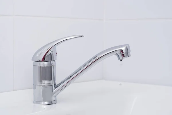 Water and faucet — Stock Photo, Image