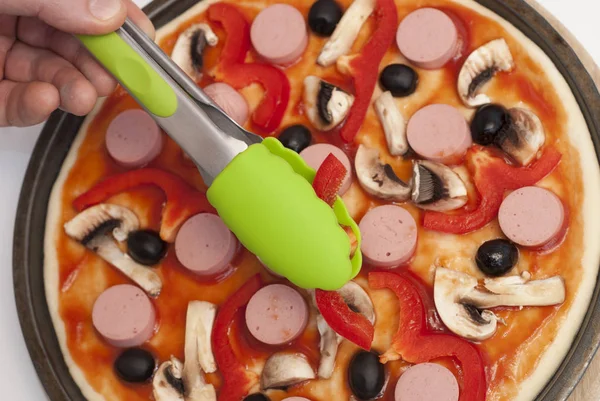 Man is cooking pizza — Stock Photo, Image