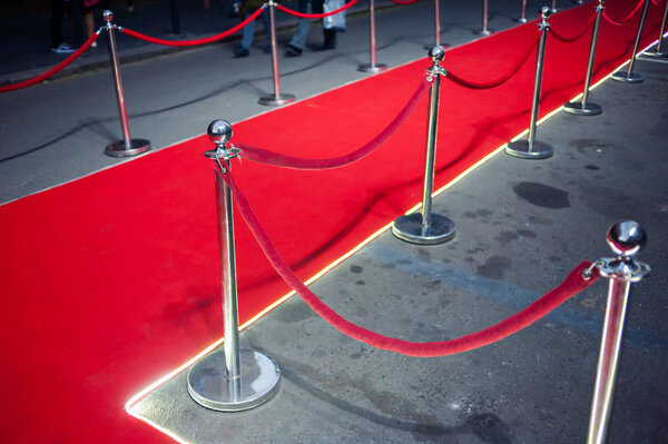 Red Carpet -  is traditionally used to mark the route taken by heads of state on ceremonial and formal occasions