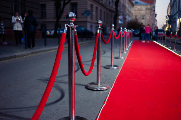 Red Carpet -  is traditionally used to mark the route taken by heads of state on ceremonial and formal occasions