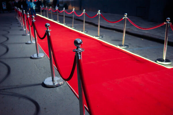 Red Carpet -  is traditionally used to mark the route taken by heads of state on ceremonial and formal occasions