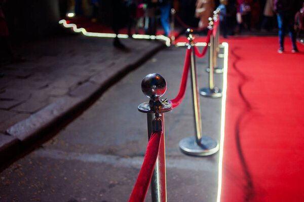 Red Carpet -  is traditionally used to mark the route taken by heads of state on ceremonial and formal occasions