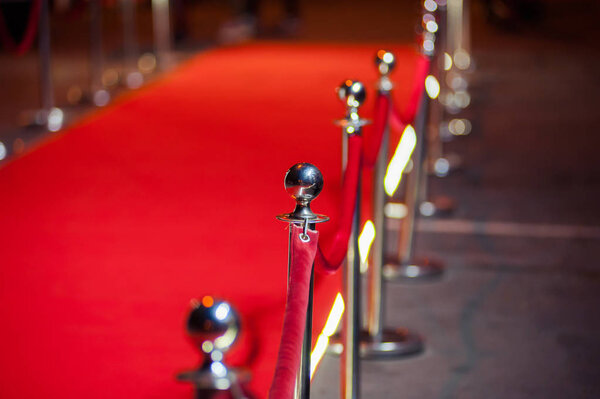 Red Carpet -  is traditionally used to mark the route taken by heads of state on ceremonial and formal occasions