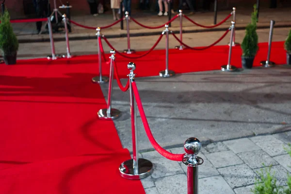 Red carpet at an exclusive event. Award ceremony red carpet Festive event or celebrity entrance concept.