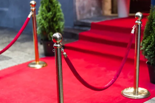 Red carpet at an exclusive event. Award ceremony red carpet Festive event or celebrity entrance concept.