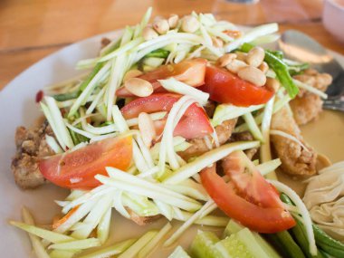 Papaya salatası (Som Tum Tay) tablo, popüler Tay gıda.