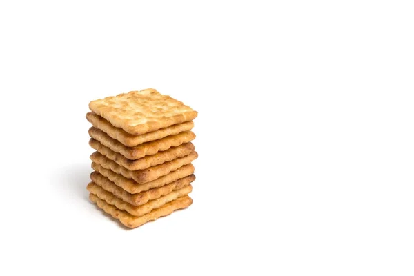 Crackers empilés sur fond blanc isolé — Photo
