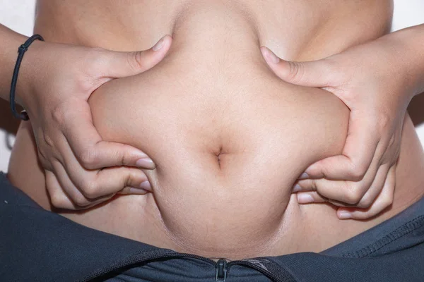 Woman belly fat overweight