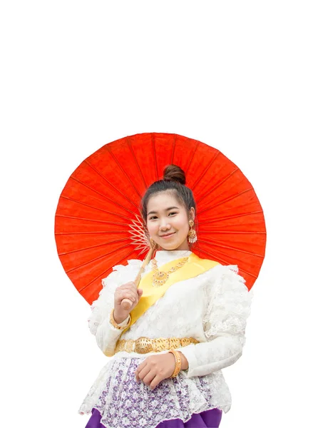 Schöne asiatische Frau trägt traditionelle thailändische Kleidung mit Regenschirm — Stockfoto