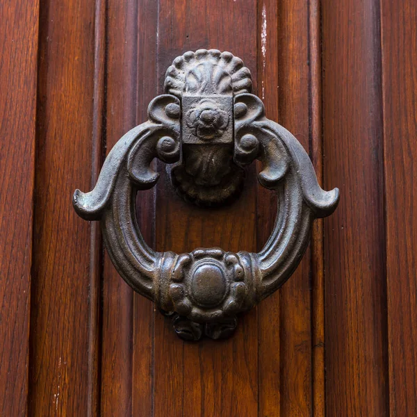 Italy: Close up of rustic old door — Stock Photo, Image