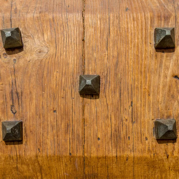 Italy: Close up of rustic old door — Stock Photo, Image