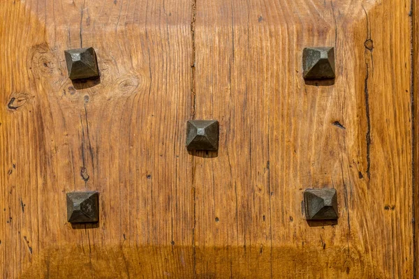 Italy: Close up of rustic old door — Stock Photo, Image