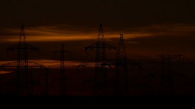 Gün doğumunda yüksek voltajlı Güç Hatları