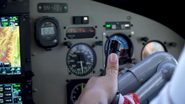 The pilots hand on the helm of the aircraft — Stock Video