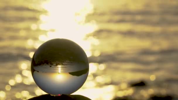 View of the sea through a glass sphere — Stock Video