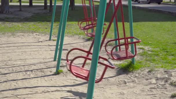 Empty Swings In Playground — Stock Video