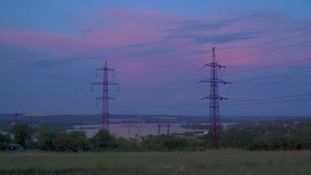 Time lapse of clouds over high voltage power line — Stock Video