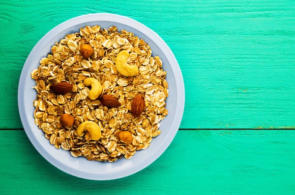  Oatmeal with nuts (hazelnuts, cashews, almonds). Oatmeal on a w