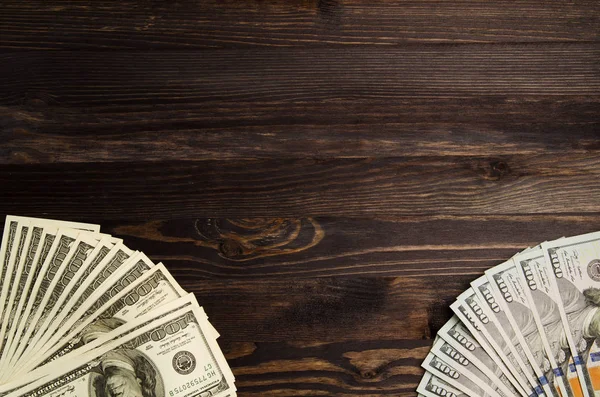 木製の背景にドル。ドルのトップ ビュー — ストック写真