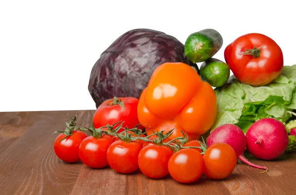 stock image   Vegetables on a table isolated on a white background . 