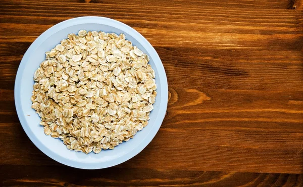 Muesli on a wooden table. — Stock Photo, Image