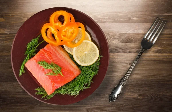 Red fish trout fillets on a plate. — Stock Photo, Image