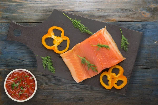 Red fish trout fillets on a plate. — Stock Photo, Image