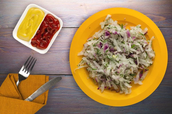 Salad daikon, onions and dill on a wooden — Stock Photo, Image