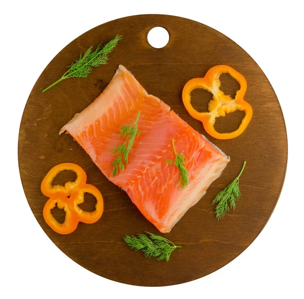 red fish trout fillets on a plate.