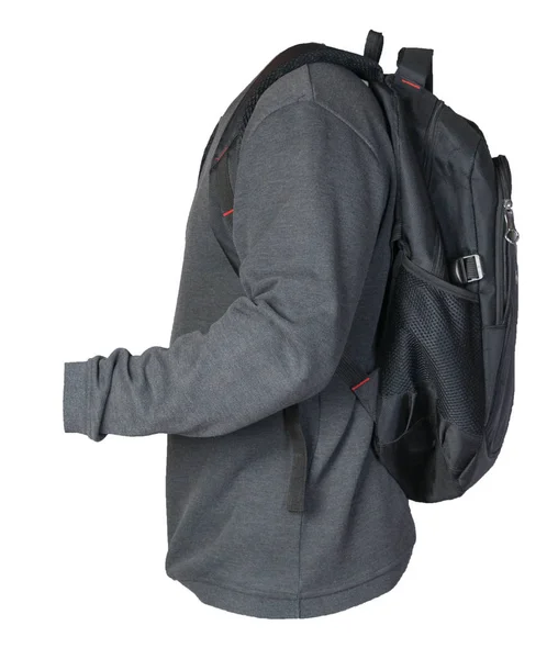 Schwarzer Rucksack, bekleidet mit einem Strickpullover — Stockfoto