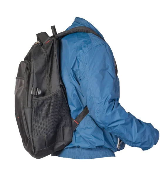 白い背景に青いジャケットに身を包んだ黒いバックパック. — ストック写真