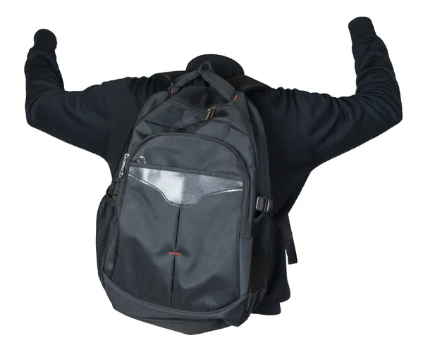 Schwarzer Rucksack, bekleidet mit einem Strickpullover auf weißem Hintergrund. — Stockfoto