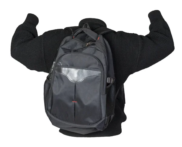 Schwarzer Rucksack, bekleidet mit einem Strickpullover — Stockfoto