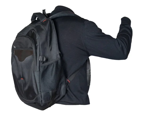 Schwarzer Rucksack bekleidet mit einem Strickpullover auf weißem Grund — Stockfoto