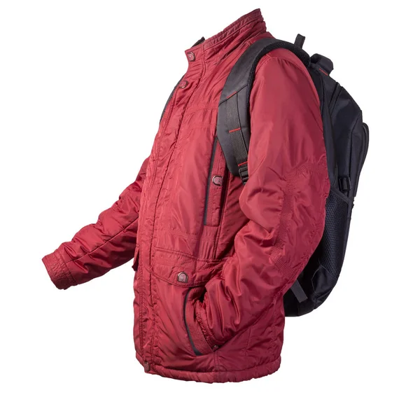 Svart ryggsäck klädd i en röd jacka isolerad på en vit ryggsäck — Stockfoto