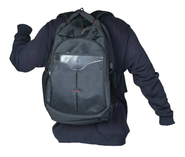 Schwarzer Rucksack bekleidet mit einem Strickpullover auf weißem Grund — Stockfoto