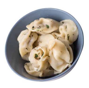 Beyaz arka planda izole bir plaka üzerinde köfte. et Dumpling