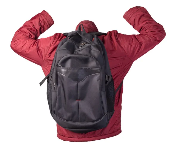 Schwarzer Rucksack mit roter Jacke auf weißem Rücken — Stockfoto