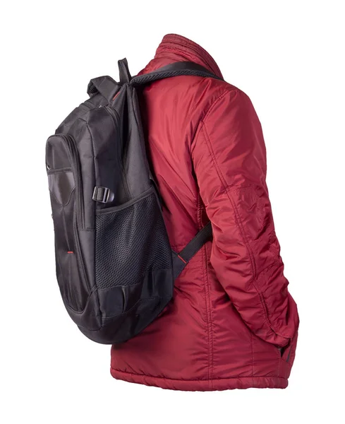 Schwarzer Rucksack mit roter Jacke auf weißem Rücken — Stockfoto