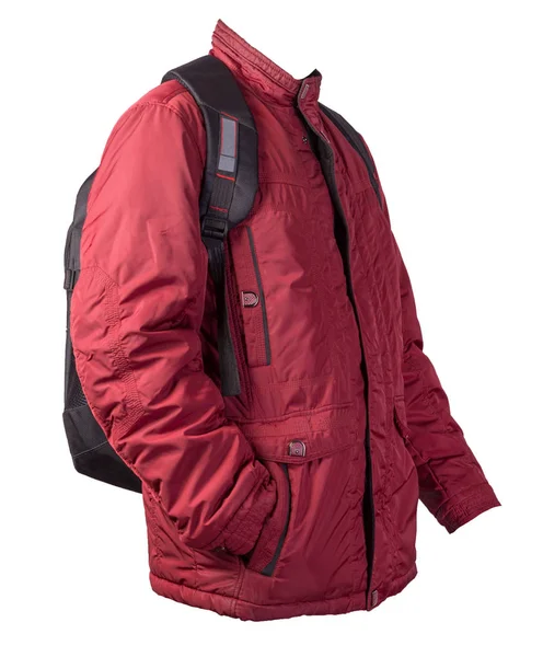 Svart ryggsäck klädd i en röd jacka isolerad på en vit bakgrund. — Stockfoto