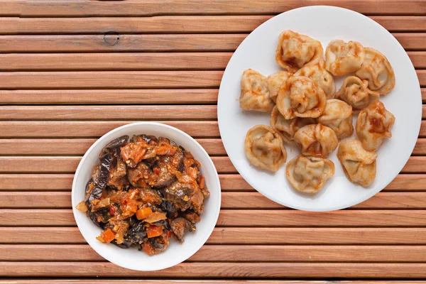 Dumplings White Plate Orange Wooden Background Dumplings Tomato Sauce Salad — Stock Photo, Image