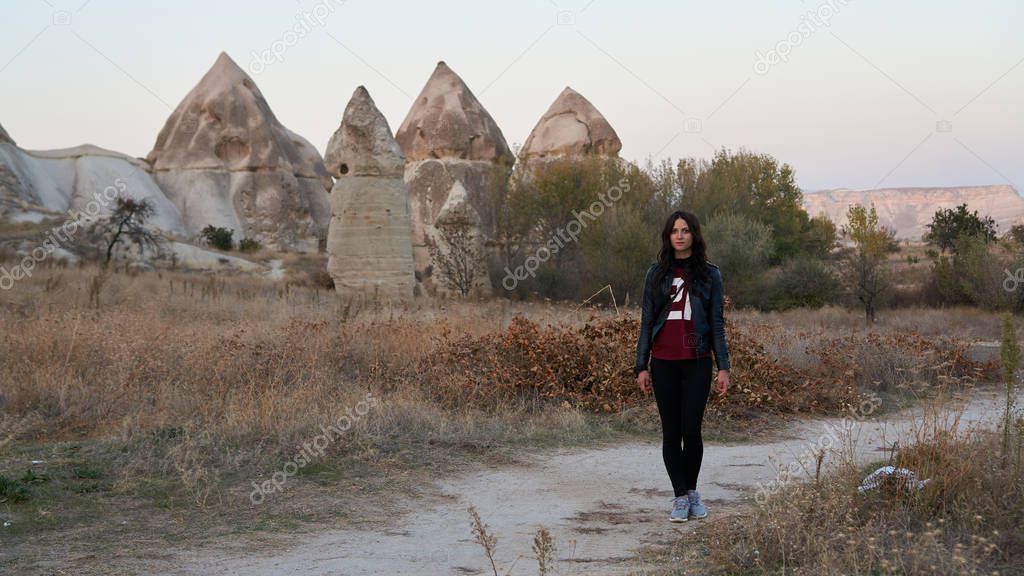 Young woman walking in Cappadocia in Turkey.