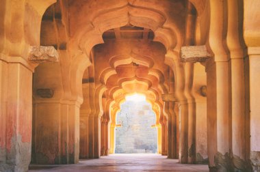 Old ruined arch of Lotus Mahal in Hampi, India clipart