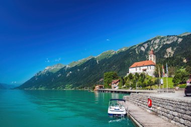 Brienz town on lake Brienz in Switzerland clipart