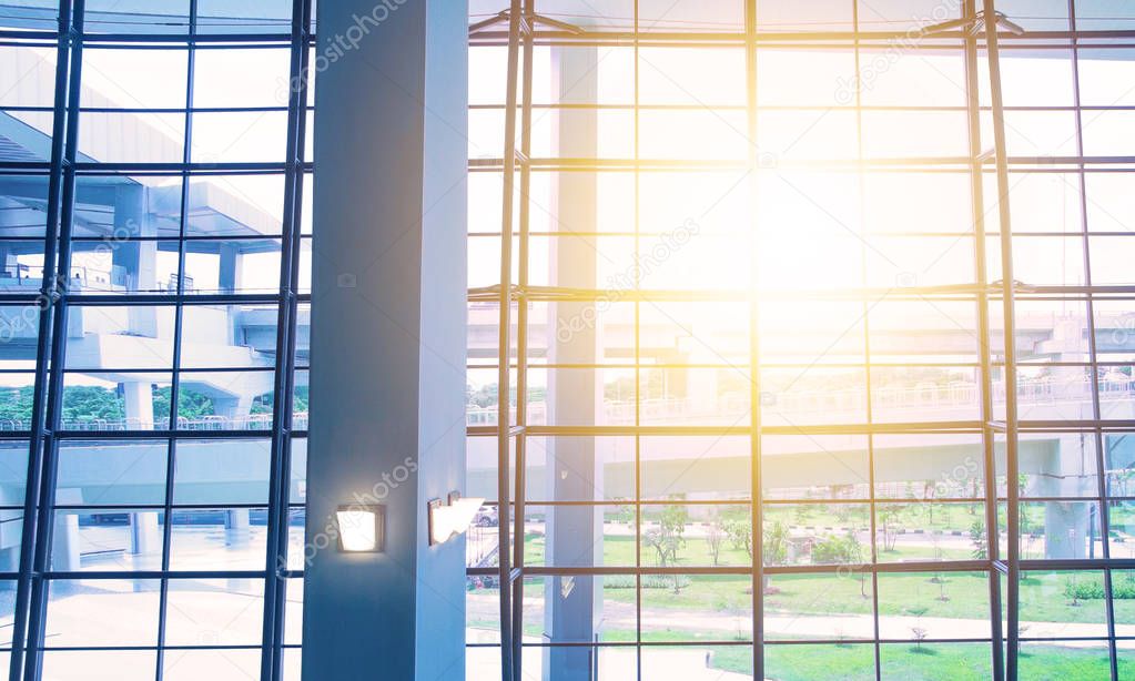 Sunlight over glass windows in an airport