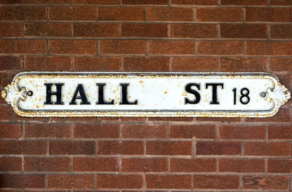 Hall Street British Vintage Street Signs against Red Brick Wall